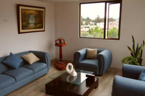 Habitación privada con estacionamiento en Quito